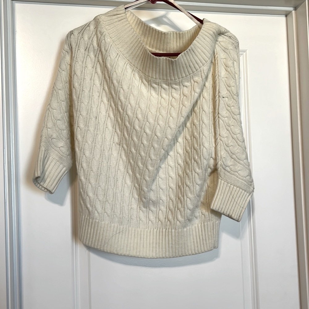 Cream, off the shoulder sweater.